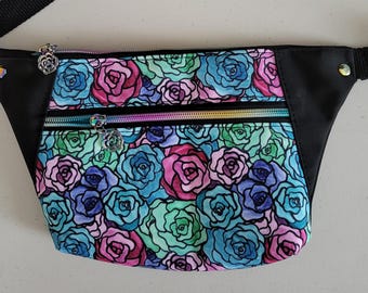 Cell phone friendly Fanny Pack/Waist/Belt Bag made of strong, durable water-repellant printed canvas. Colorful Roses and rainbow hardware.