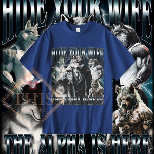 May include: A royal blue t-shirt with a graphic print of a wolf wearing a suit and the text "Hide Your Wife The Alpha Is Here".