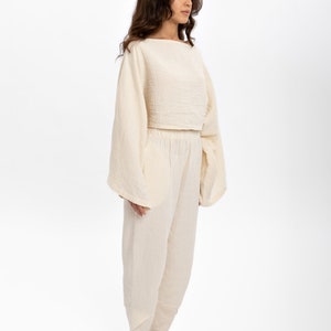 Lightweight cotton blouse offering a natural feel, long-lasting wear, and no ironing required.