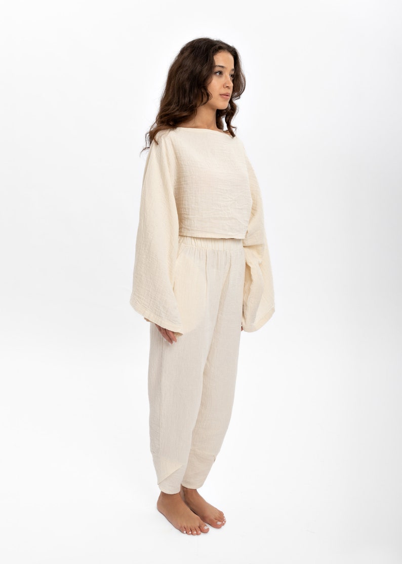 Lightweight cotton blouse offering a natural feel, long-lasting wear, and no ironing required.