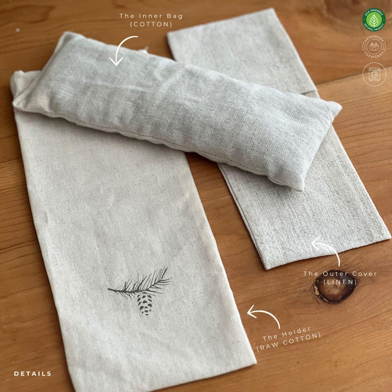Folded organic linen eye pillows in various earthy shades, designed for sustainable self-care.