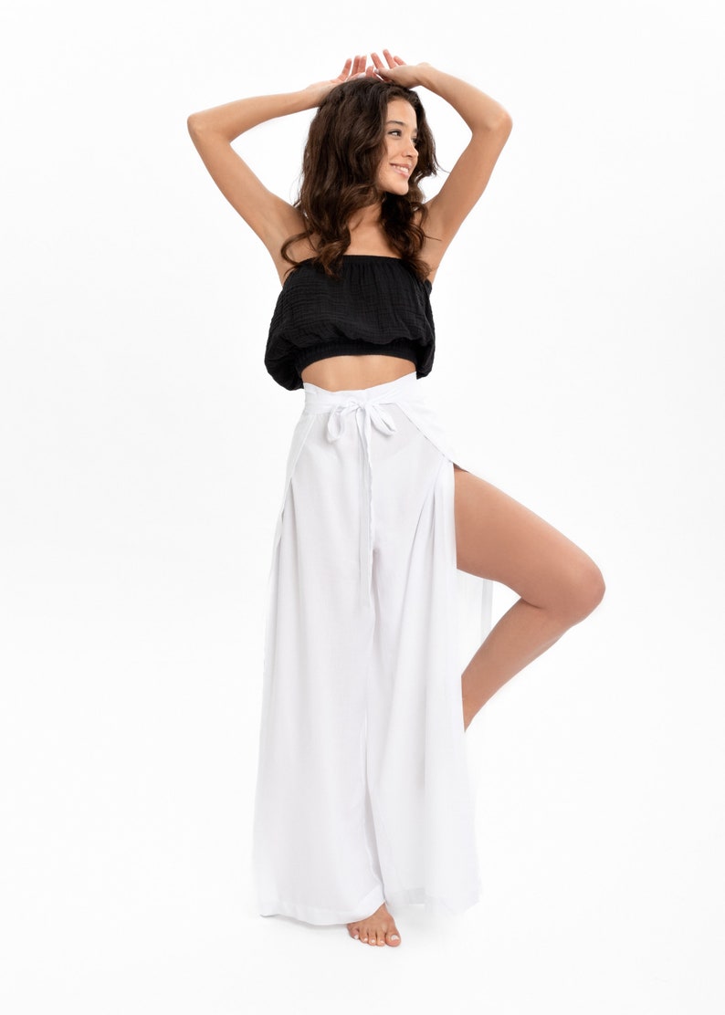 Chic Yoga Pants for Women - Versatile for Yoga, Dance, and Lounging. These white, boho-style flared pants provide ultimate comfort and style. A fantastic addition to your organic clothing collection and a thoughtful yoga gift choice.