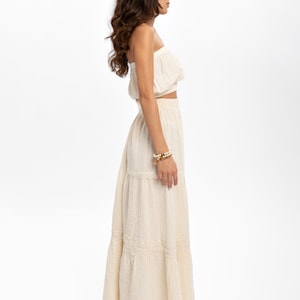 Get ready to sway in the breeze with our long flowy skirt, perfect for that bohemian charm.