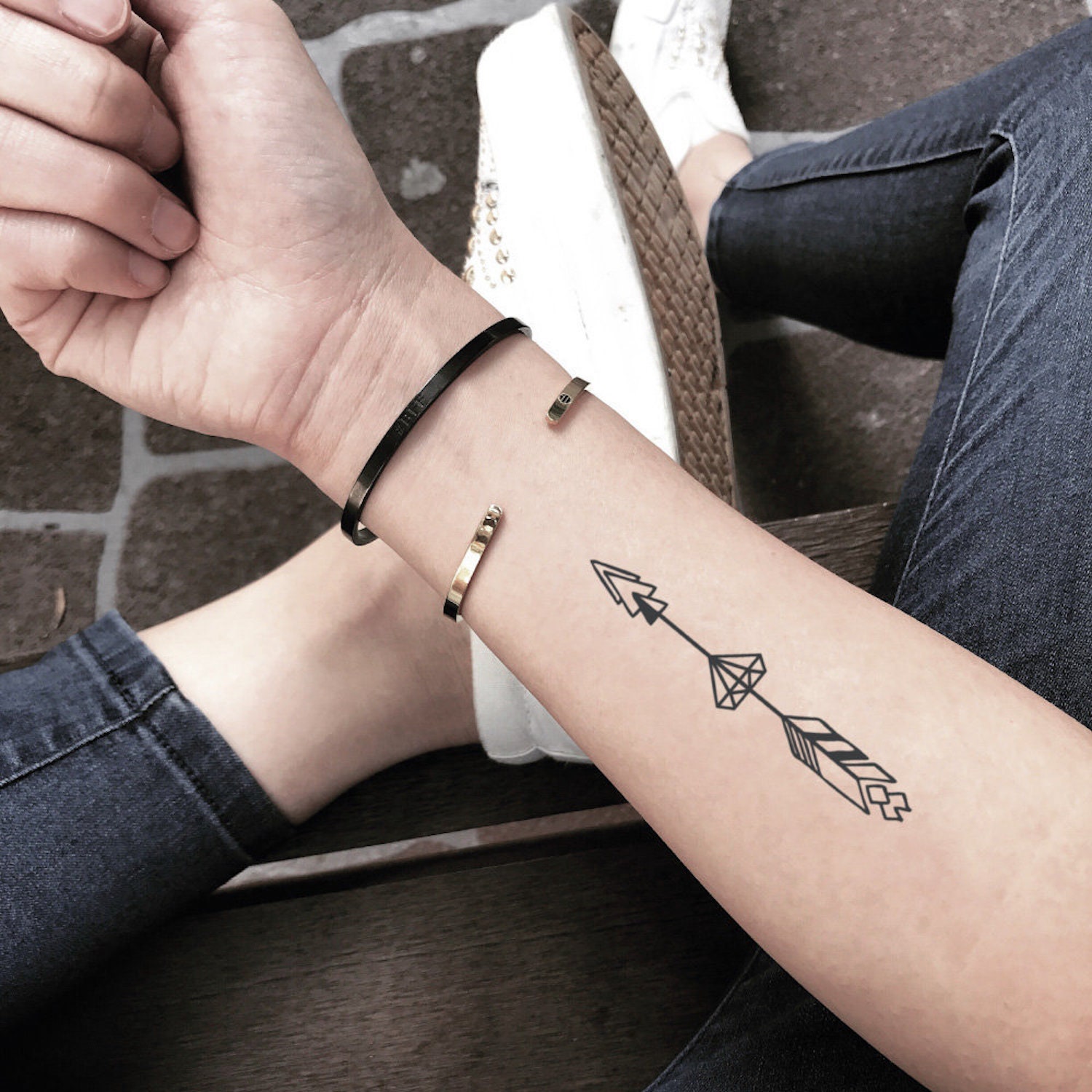Wrap Around Arrow on Wrist Tattoo Idea | Wrist tattoos quotes, Mens arrow  tattoo, Arrow tattoos