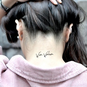 Kia Kaha Etiqueta engomada del tatuaje temporal (conjunto de 2)