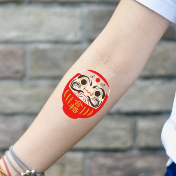 Premium Vector  Daruma tattoo japanese