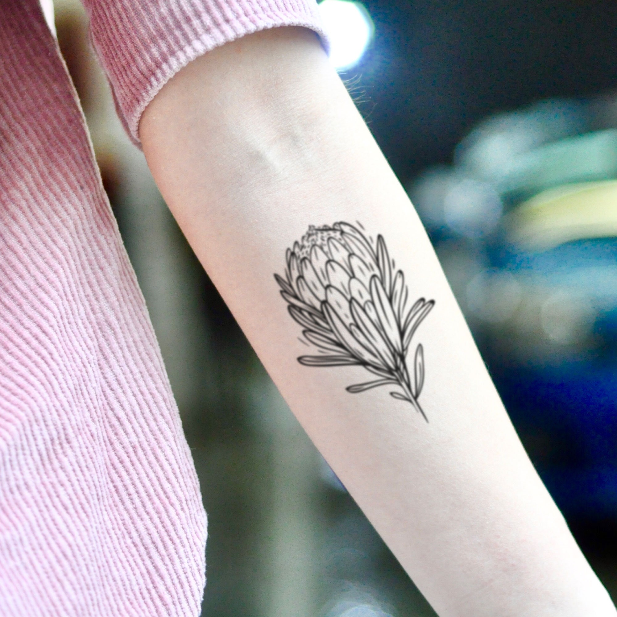 The Butcher  Tiny protea flower by thebutcherbrand floraltattoo  blackandgreytattoo flowertattoo smalltattoos delicatetattoo  Facebook