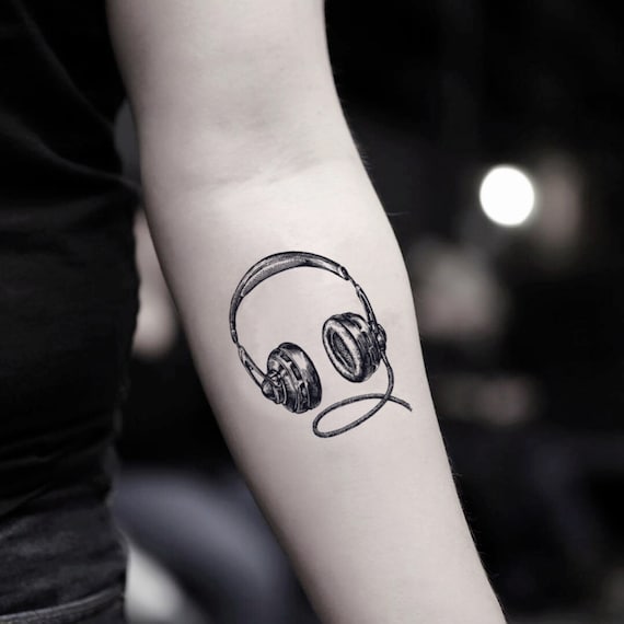 Tattoo uploaded by Noa • #music #earphones #microtattoo #3rl #blackandgrey  • Tattoodo