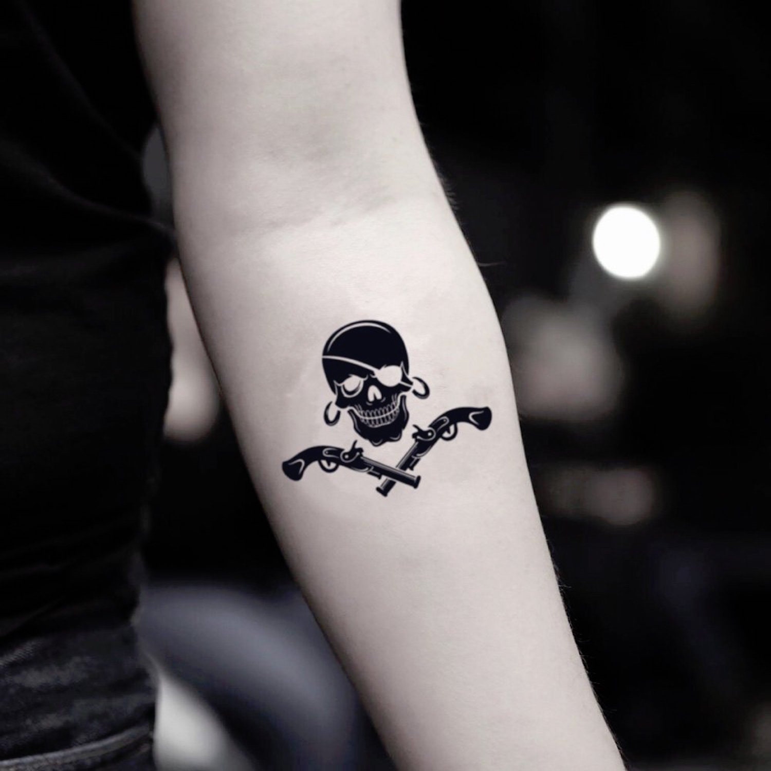 Colored american flag punisher skull tattoo on upper arm