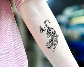 Poison IV Tattoo Parlour on Twitter Minimalist Tiger cub behind the  ear Done by Alessandro httpstco0XgbjKcYOm  Twitter