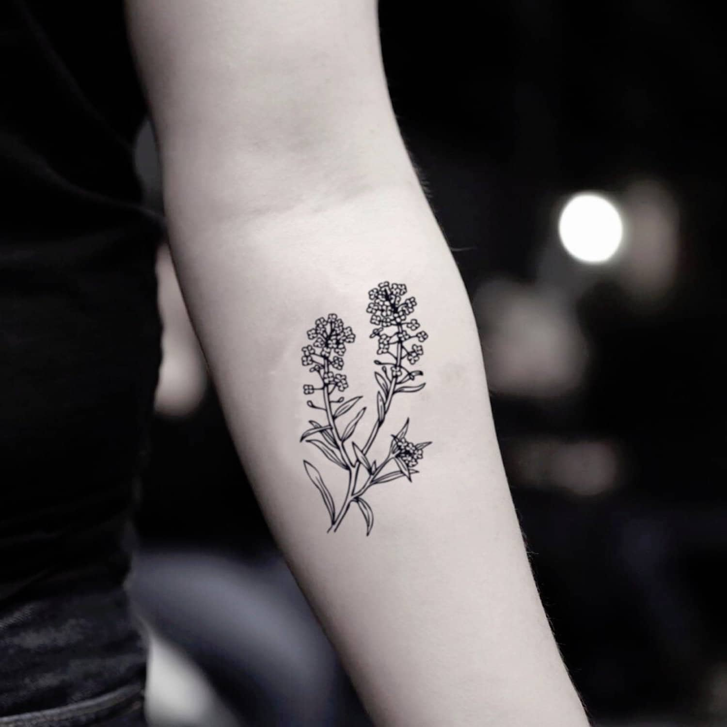 Forgetmenot bracelet tattoo on the left forearm