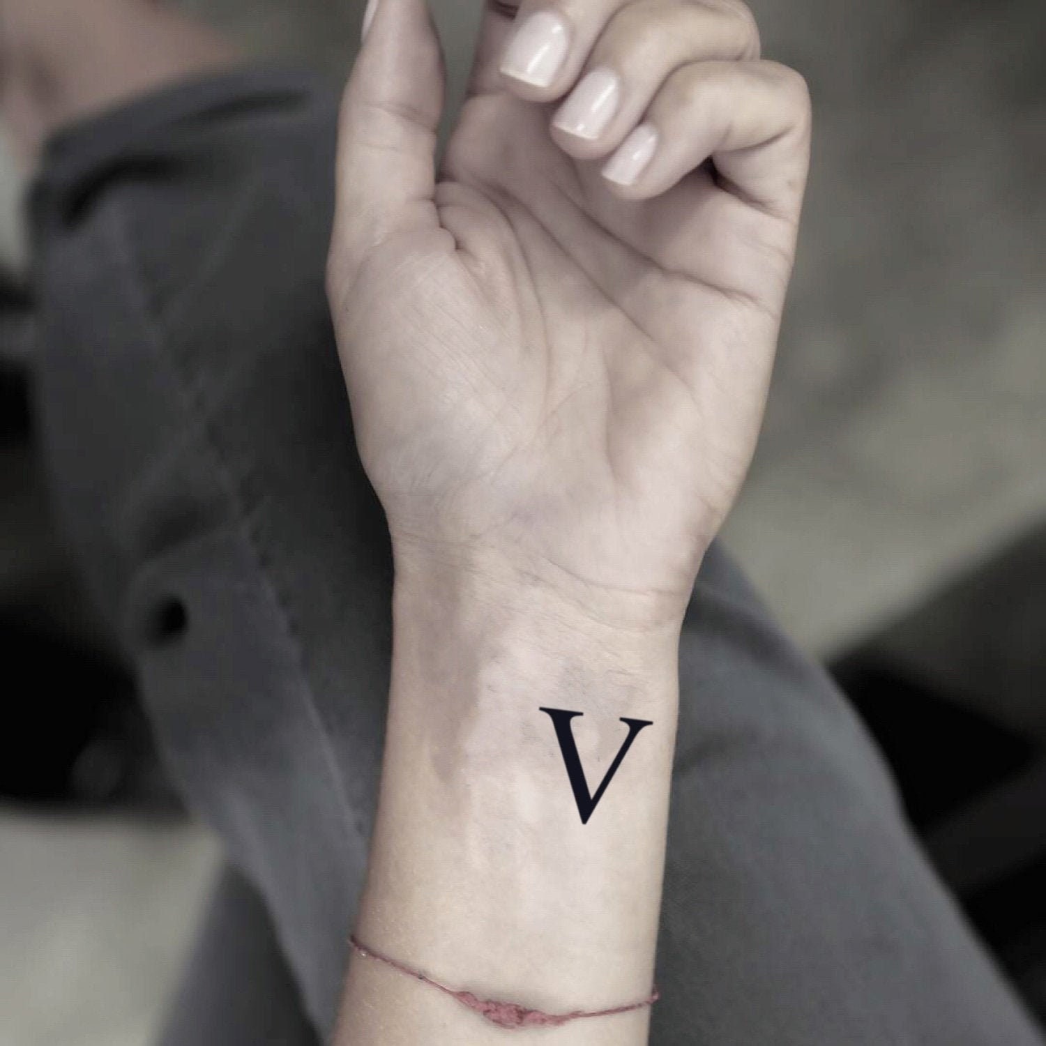 Letter V tattoo by Mavka Leesova  Tattoogridnet