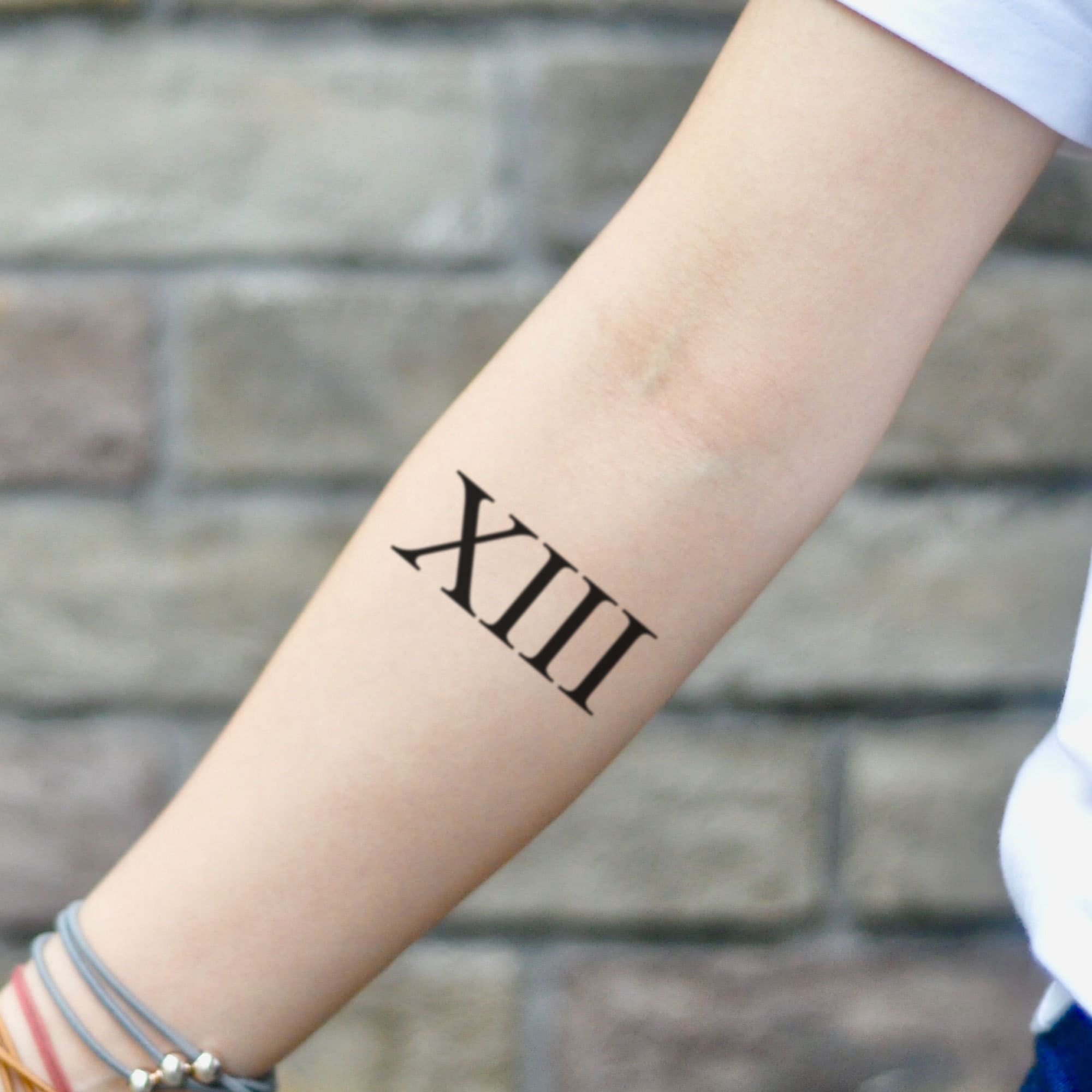 xiii tattoo wrist