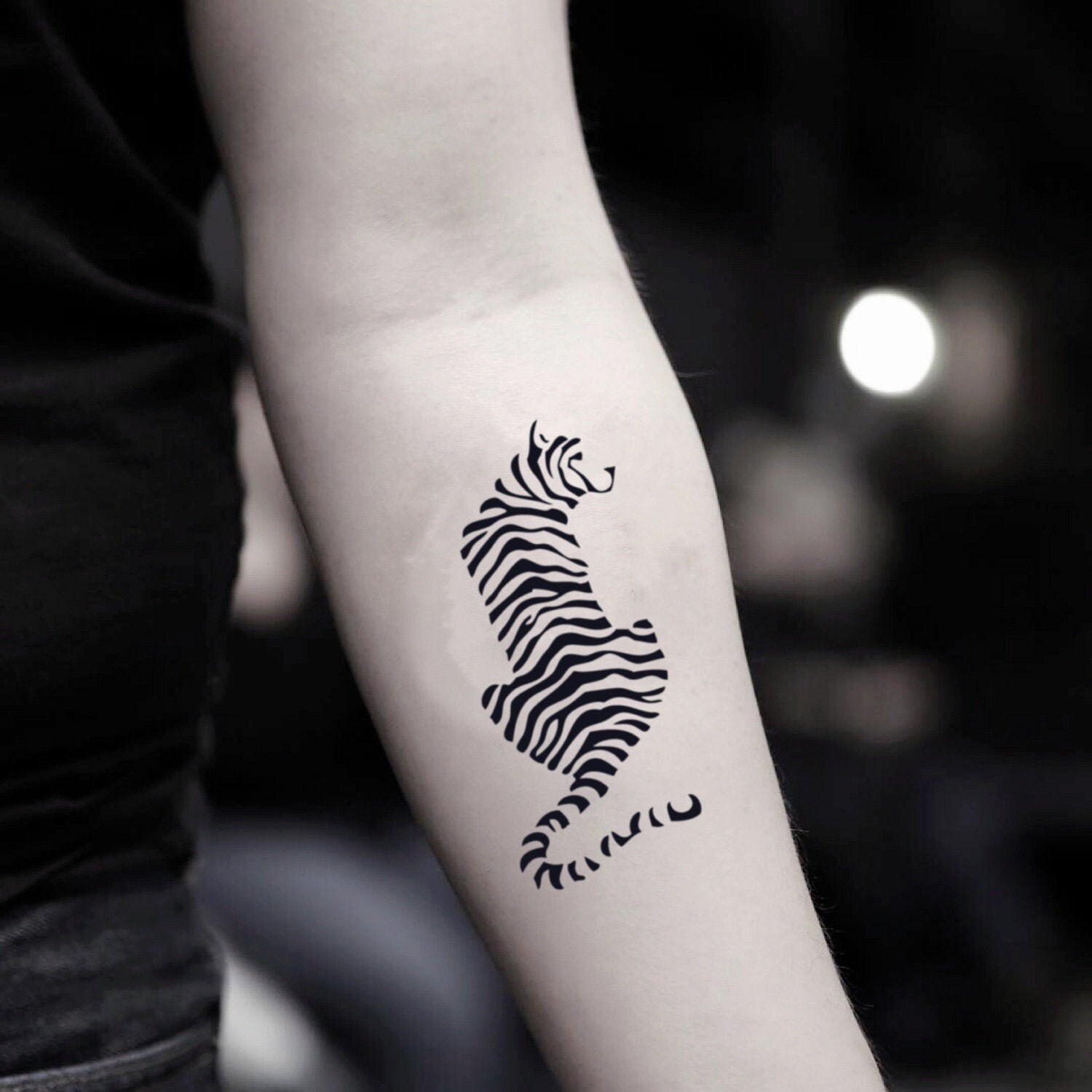 Tiger stripes tattoo