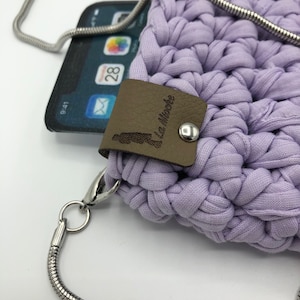 Crochet and chain crossbody phone holder.