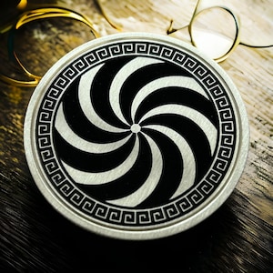 Spiral challenge coin