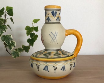Spanish Talavera Mave earthenware candle holder, hand painted in matt glaze and soft pastel motifs.