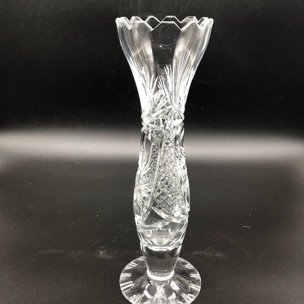 Vintage Bohemia Crystal cut vase on foot. Pinwheel design and sawn edge.   Beautiful and bright cut crystal vase.