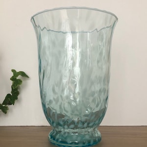 Light blue clear glass vase or lantern holder, decorated with flower motifs in white molten glass, blue confetti vase.