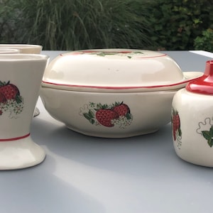 Chodziez Poland with strawberry decorated ceramic dessert set: 1 large bowl with lid, 4 small bowls and 1 sugar or cream bowl with lid.