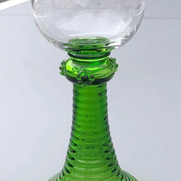 Vintage cut crystal Roemer wine glass with grape vine and green ribbed hollow base and spines. German made from 1960'