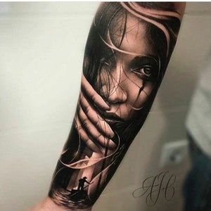 May include: Black and grey realistic tattoo of a woman's face with her hand covering part of her face. The tattoo is on a person's arm. A small silhouette of a person in a boat is visible in the background.