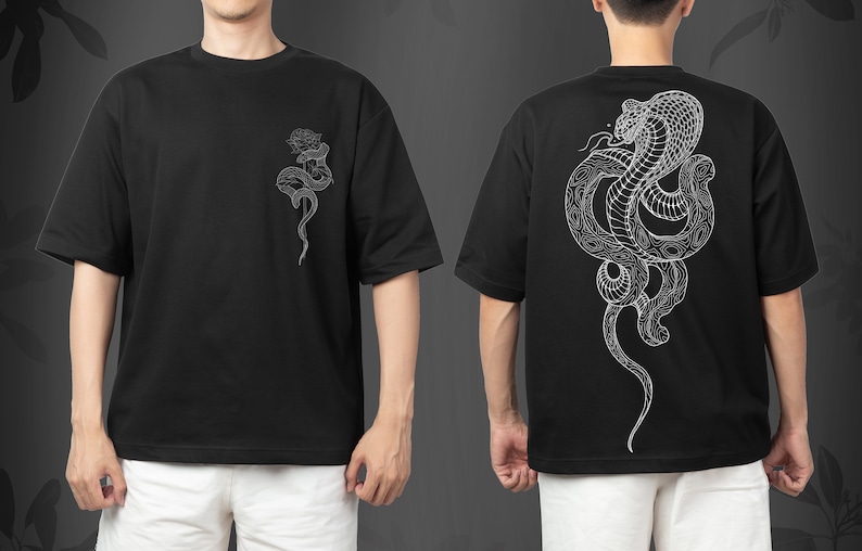 May include: Black t-shirt with a white outline of a snake on the front and a larger white outline of a snake on the back.