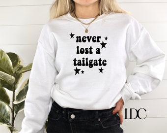 Never Lost A Tailgate Crewneck - Trendy Football Season Clothing