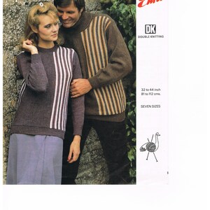 May include: A couple wearing striped sweaters in brown, beige, and white. The woman is wearing a purple skirt. The image is from a knitting pattern book titled "Emu" with the text "DK Double Knitting" and "32 to 44 inch 81 to 112 cms. SEVEN SIZES".