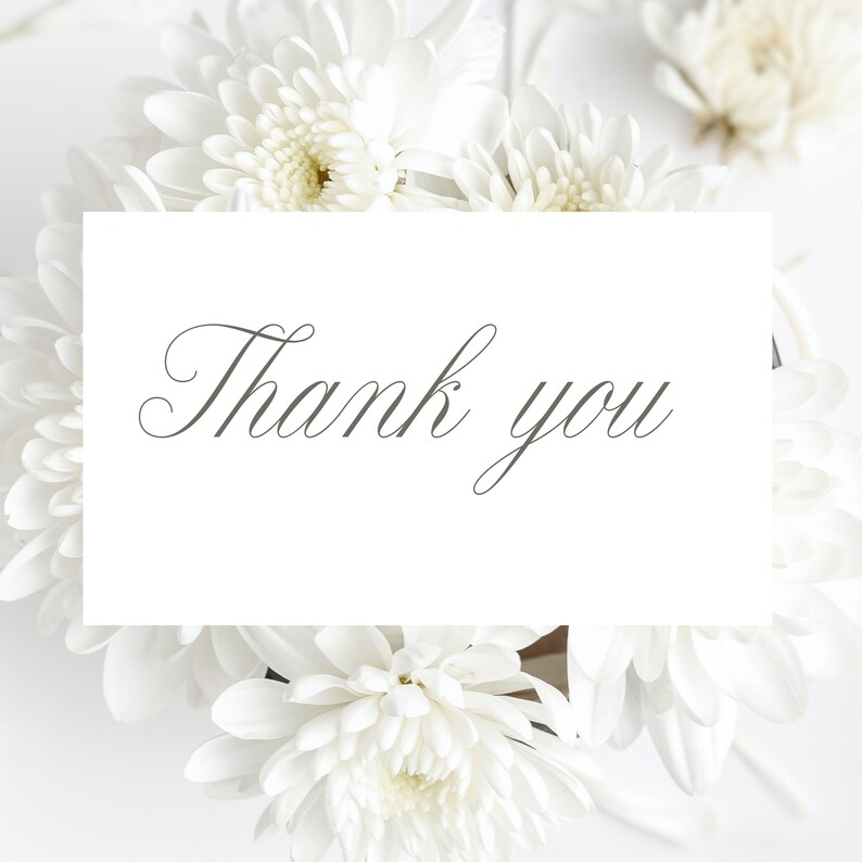 May include: A white card with the text "Thank you" written in a cursive font, surrounded by white flowers.
