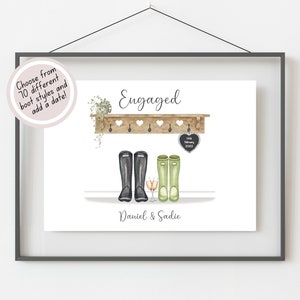 May include: A watercolour illustration of a wooden shelf with two pairs of boots hanging on hooks. The boots are black and green. The shelf has a small potted plant and a heart-shaped chalkboard with the text "Engaged" and a date. The text "Daniel & Sadie" is written below the shelf.