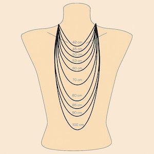 May include: A beige mannequin back displays a selection of necklaces, each with a different length. The lengths are labeled in centimeters, ranging from 42 cm to 100 cm, providing a visual guide for necklace sizing.