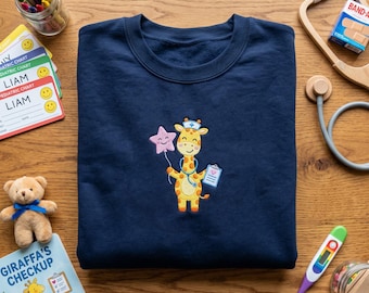 Embroidered Giraffe Nurse Sweatshirt, Cute Pediatric Nurse Hoodie, Medical Assistant Gift, Nursing Student Apparel, Animal Lover Nurse Top