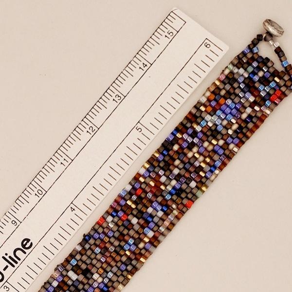 Hodge Podge Bracelet, sleek cuff style in 2-drop peyote stitch, mostly blues and browns, but many other colors, magnetic closure