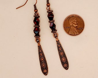 Antique Copper, Red, & Blue Earrings, 2 multi-color bicones between spacers, dangle with raised rings on front, flat back, ear wires