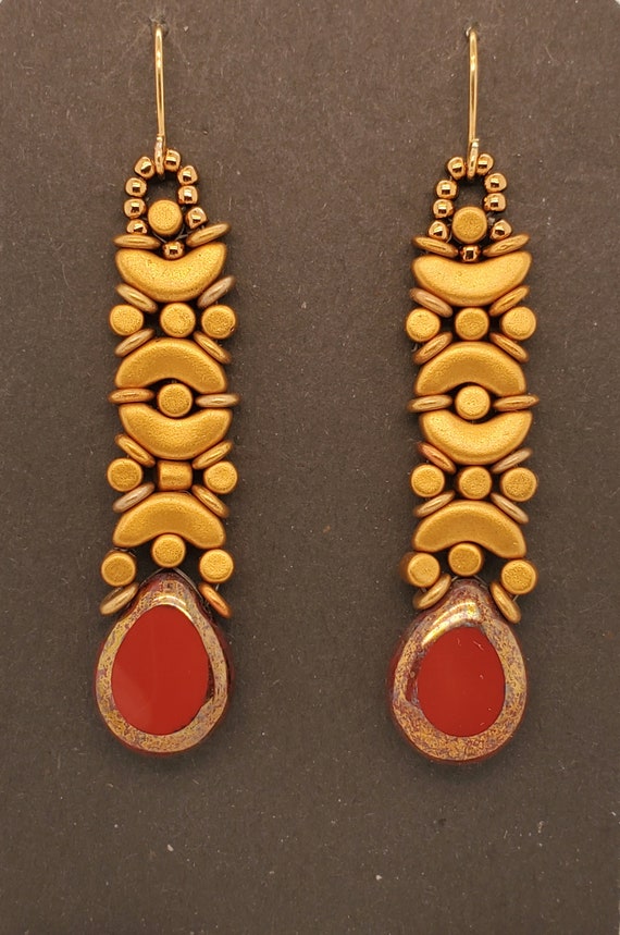 Green flower dangler antique golden earrings at ₹950 | Azilaa
