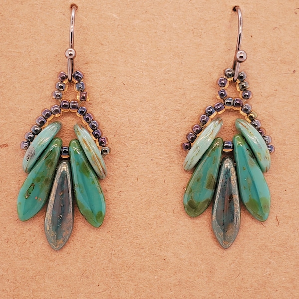 Godet Earrings with turquoise greens and Picasso finish, dagger and crescent beads, seed beads are lined blue-green, gunmetal ear wires