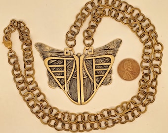 Art Deco Style Moth Necklace, antique brass tone, raised details, hollow back, chunky ribbed rolo chain, lobster clasp