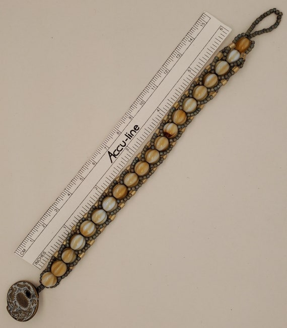 Beige Gray Flat Spiral Bracelet Melon Bead Core Cylinder Beads