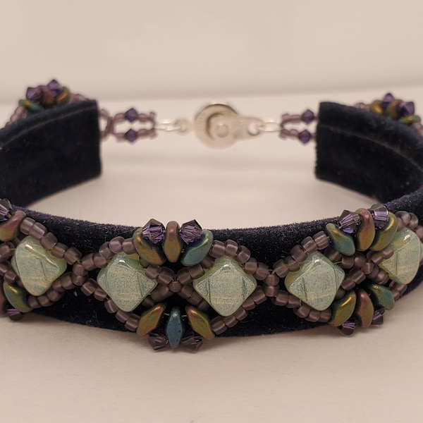 Diadem Bracelet in greens and purples, milky green Silky beads, green iris SuperDuo beads, Swarovski bicone crystals, ball joint clasp