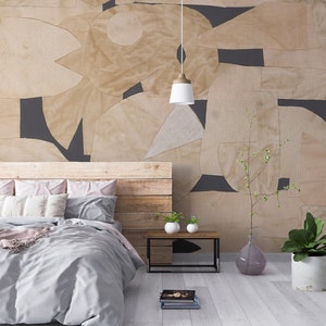 Minimalist-inspired wallpaper mural with a collage of beige geometric cutouts over a dark base, providing a sophisticated and removable wall decor option.