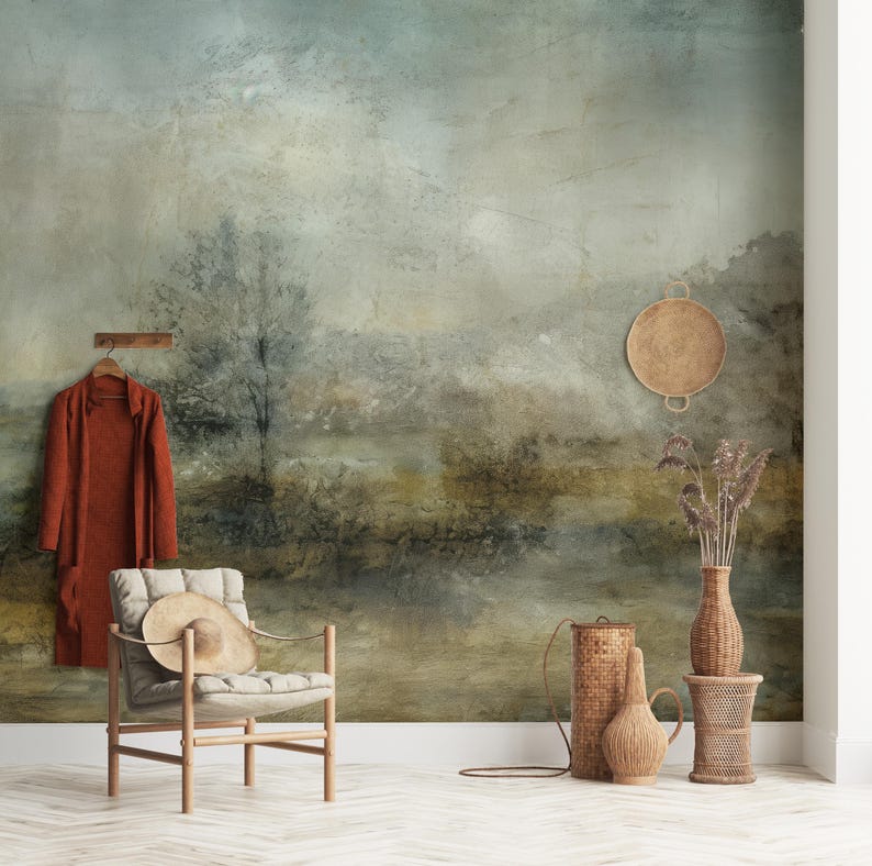 May include: A watercolor-style wall mural depicting a misty landscape with a muted color palette of greens, blues, and browns. The mural features a single tree in the foreground and a hazy background.