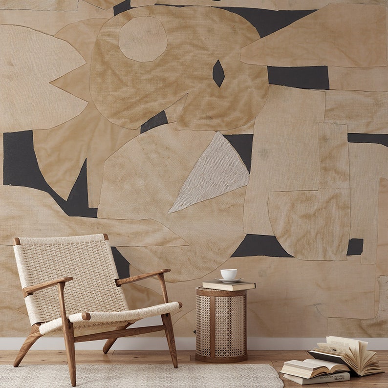 Chic, self-adhesive mural wallpaper featuring irregular beige geometric figures on a dark background, suitable for a quick room transformation.