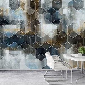 May include: A geometric pattern wallpaper with a textured, abstract design in shades of blue, gray, and brown. The wallpaper features a repeating pattern of cubes with a white outline.