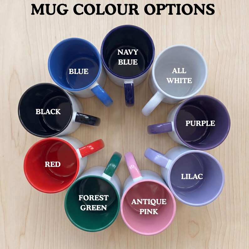 May include: A collection of ceramic mugs in various colors, including blue, black, red, green, and pink. Each mug has a white exterior and a colored interior and handle. Text at the top reads "MUG COLOUR OPTIONS".