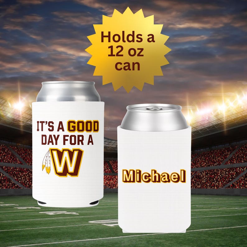 May include: Two white can coolers with text and graphics. One cooler says "IT'S A GOOD DAY FOR A W" with a team logo. The other cooler says "Michael". A gold starburst graphic says "Holds a 12 oz can".