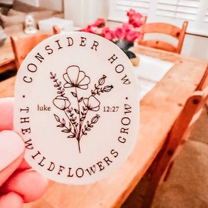 May include: A rustic wooden sign with the text "Welcome to our home" in a handwritten style. The sign features a distressed finish and a simple, inviting design, perfect for a front porch or entryway.