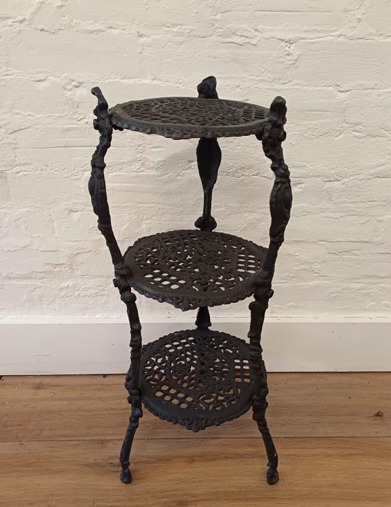 Vintage cast iron ornate plant stand