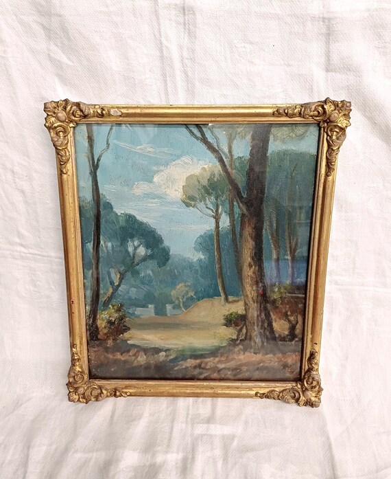 Gilt-framed landscape oil painting