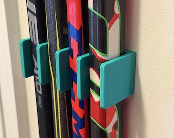Soporte para palos de hockey de pared para 4 palos